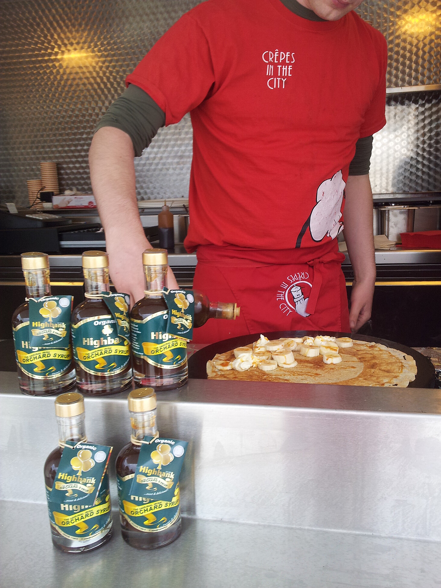 200ml bottles of syrup on the counter of a pancake truck at Bloom