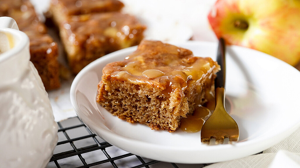Table setting with Sticky Toffee Pudding on plate