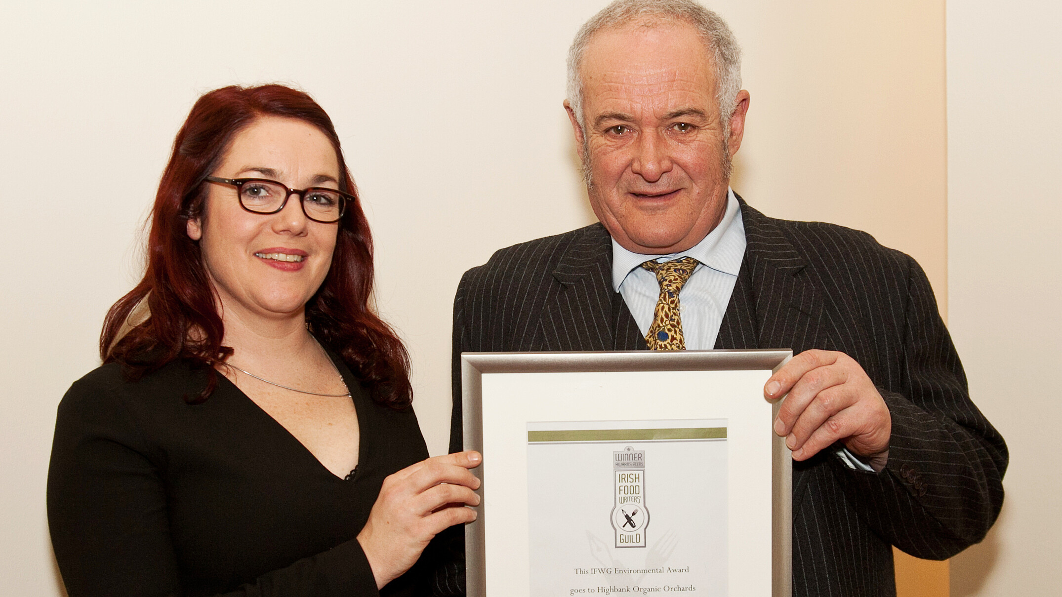 presentation of The Irish Food Guild Environmental Award 2016 with two people in picture