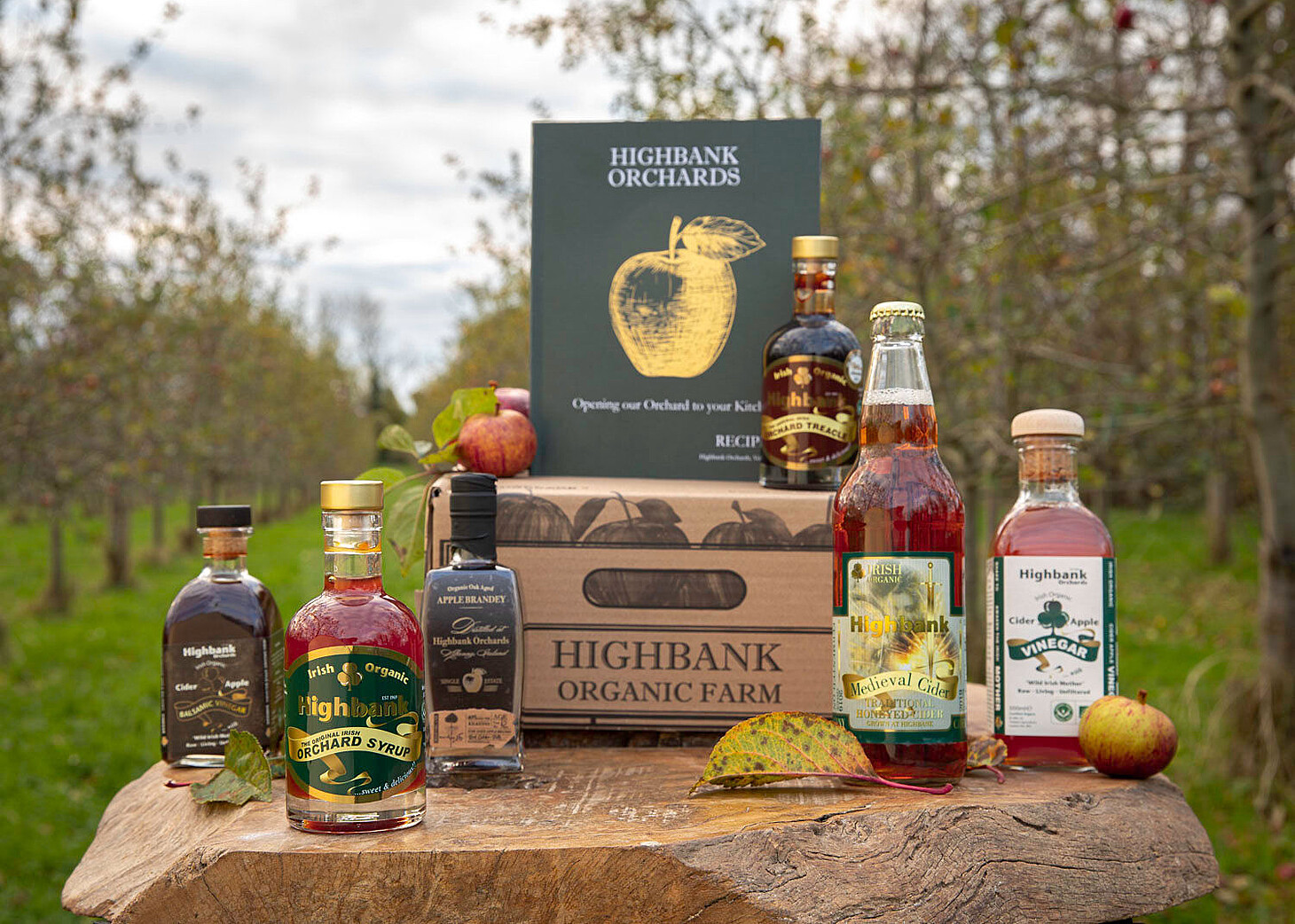 Selection of Highbank Organic Orchards products displayed in-situ, in the orchard.