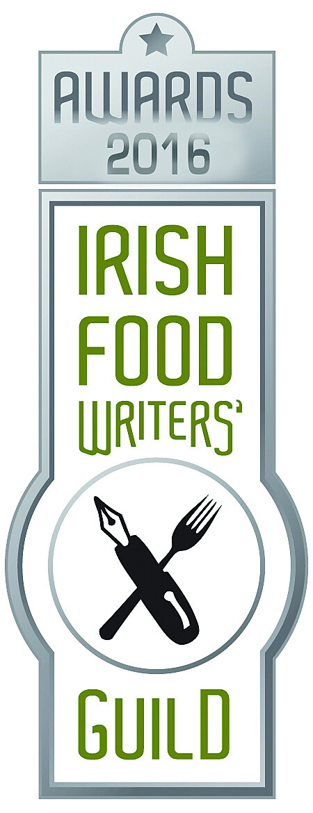 logo of Irish food writers guild with a crossed pen and fork