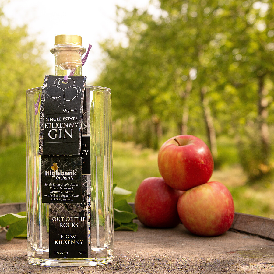 Glass bottle in orchards with 3 x red apples Organic Kilkenny Apple Gin 700ml