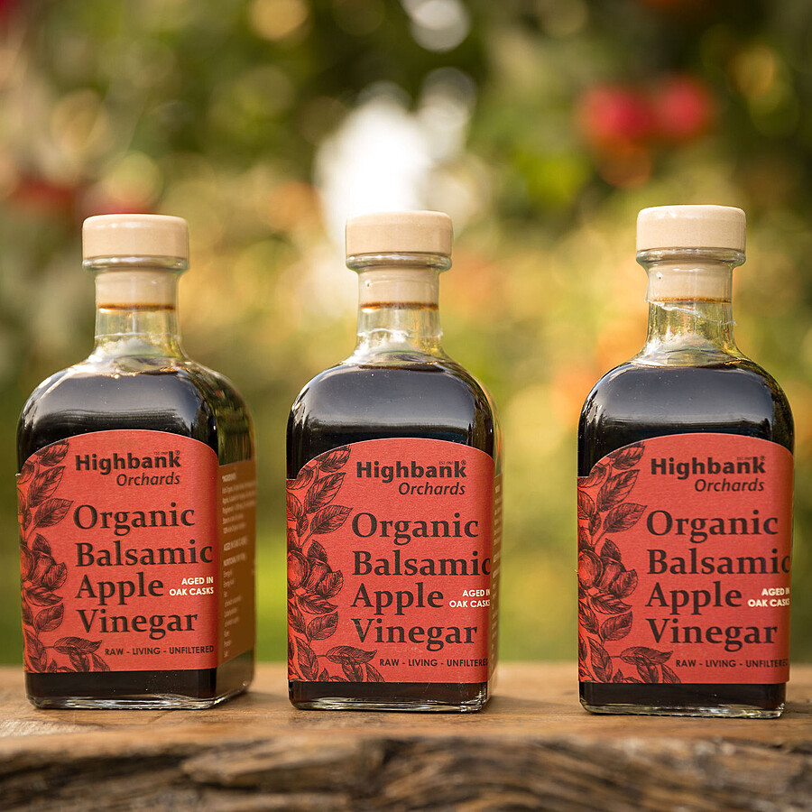 3 x glass 250ml bottles of Highbank Oak aged apple balsamic vinegar in the orchards on wood. Deep red labels.