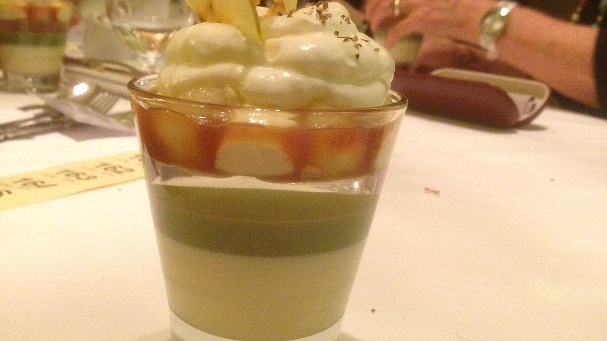 layers trifle at award ceremony with orchard syrup on the top