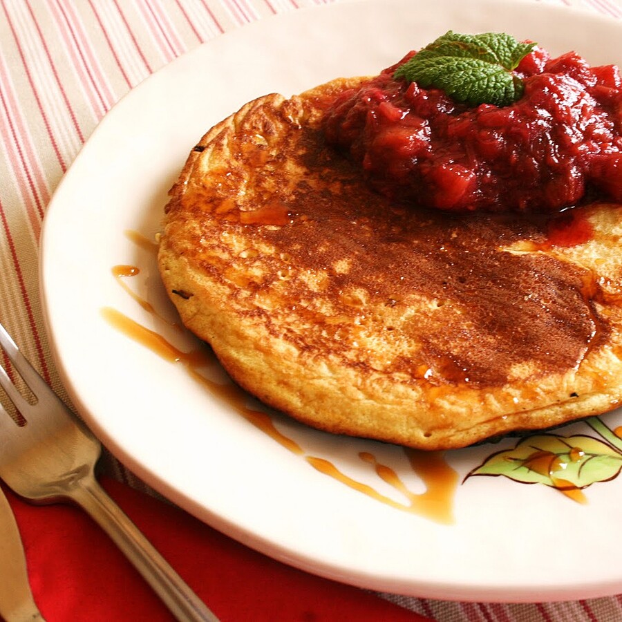 omelette with fruit and apple syrup drizzled